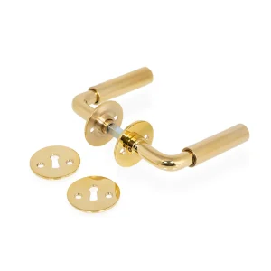 Funkis Espergærde dörrhandtag i polerad mässing inkl. rosett och nyckelplatta